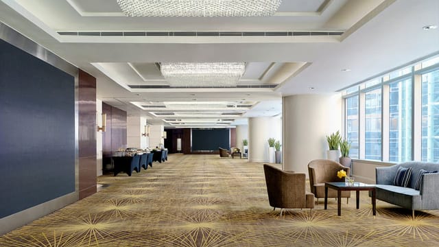 Spacious meeting room at Cordis, Hong Kong for conferences and networking events.