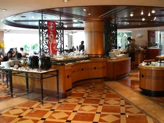Buffet setup in Gold Coast Hotel, elegant decor for catering events and receptions.