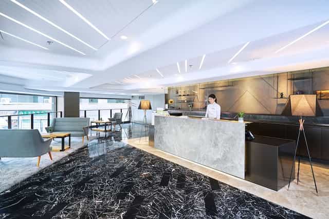 Modern reception area at Hotel Ease Tsuen Wan, perfect for meetings and events.