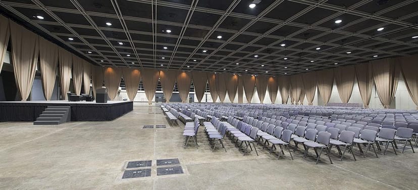Conference room with gray chairs in Hong Kong venue for seminars and workshops.
