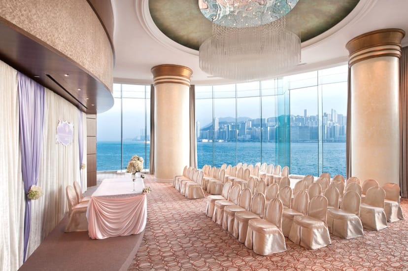 Elegant event space with waterfront view, ideal for weddings and corporate gatherings.