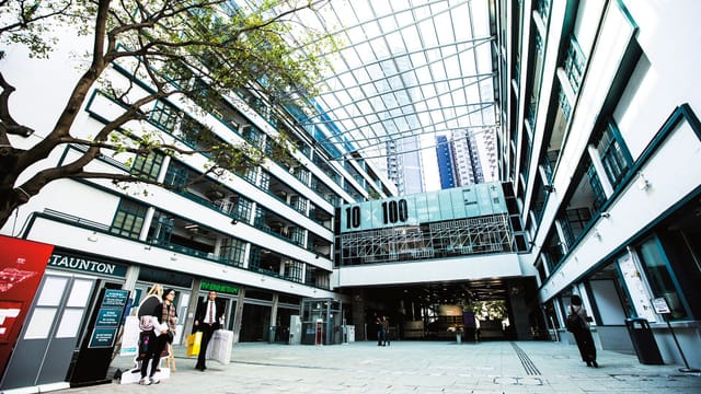 Modern open-air venue at PMQ, ideal for conferences and corporate events.