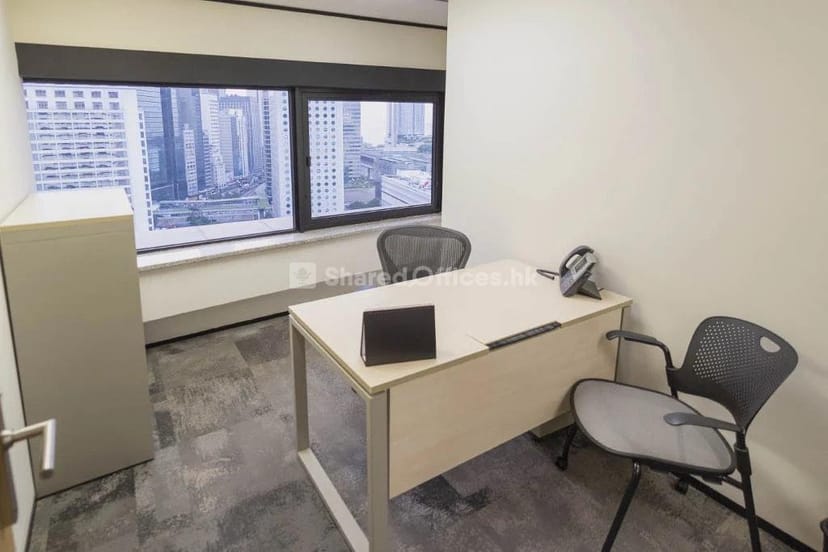 Modern virtual office space with city view, ideal for meetings and collaborations.