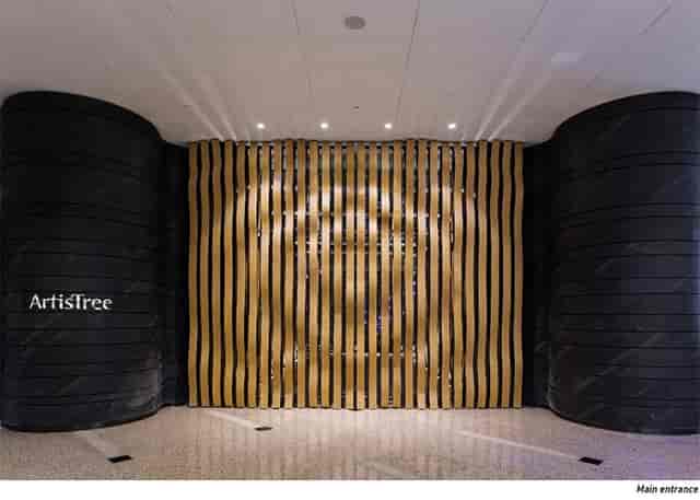 ArtisTree entrance feature with wooden slats, ideal for events and branding opportunities.