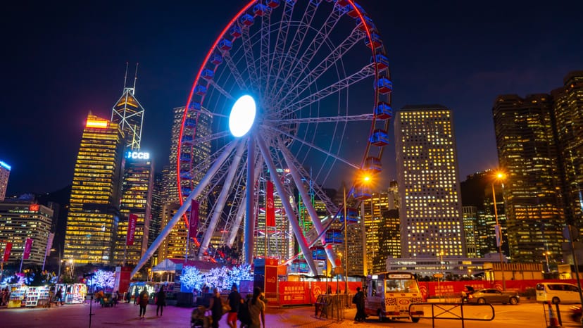 Hong Kong Observation Wheel illuminated at night, perfect for events and celebrations.