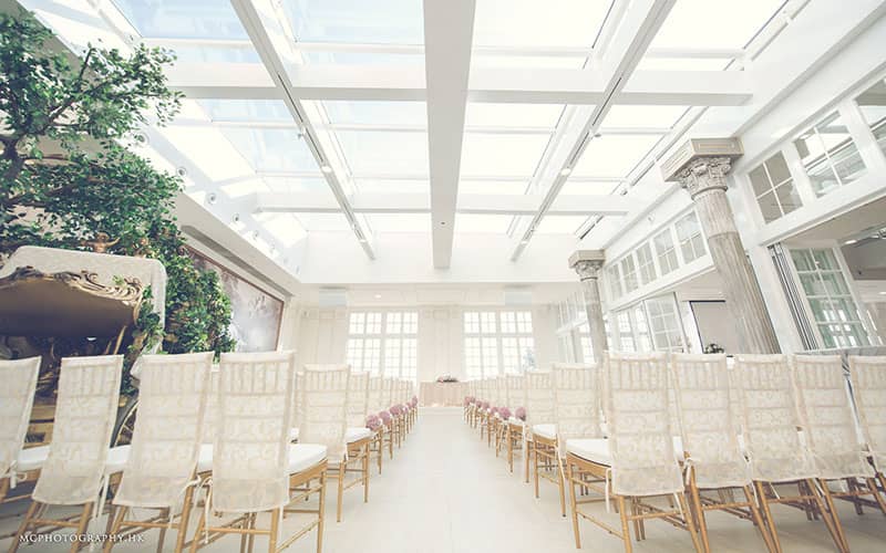 Elegant outdoor event space in The Glasshouse, perfect for weddings and corporate gatherings.
