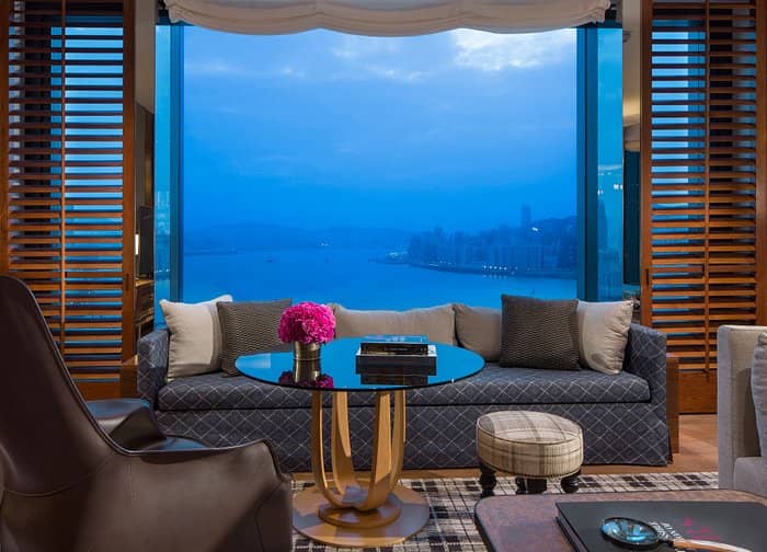 Victoria Suite lounge at Rosewood Hong Kong with waterfront view, ideal for events.
