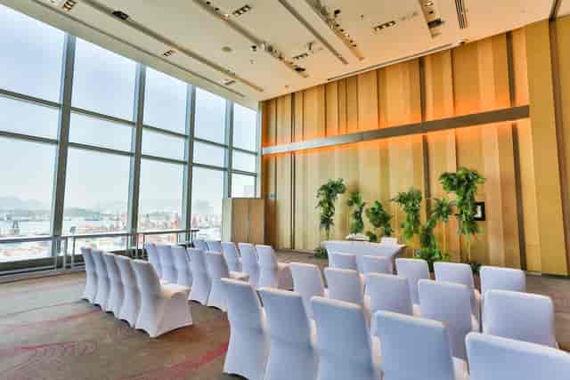 Modern Great Room at W Hong Kong with panoramic views, perfect for corporate events.