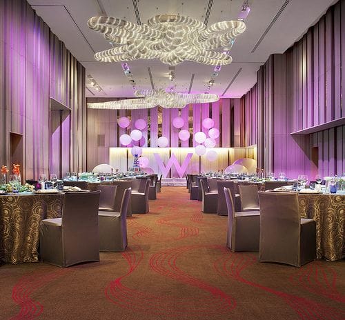 Great Room at W Hong Kong, elegant event space with purple lighting for corporate events.