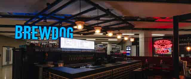 BrewDog Edinburgh Airport bar with modern design, ideal for networking events and social gatherings.