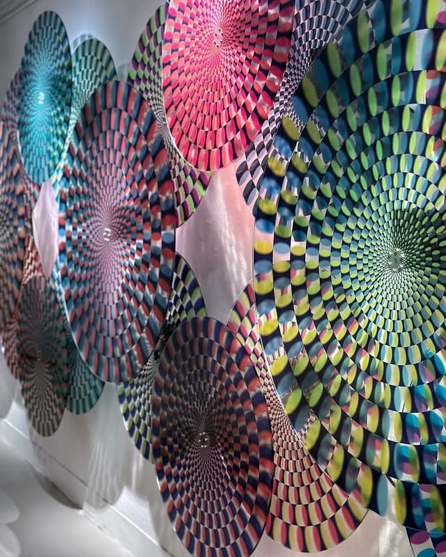 Vibrant swirling patterns at Pao Galleries, Hong Kong Arts Centre for events and branding.