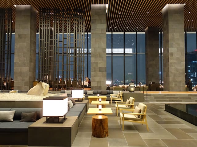 Sophisticated Aman Tokyo lobby with sleek design, ideal for networking events and receptions.