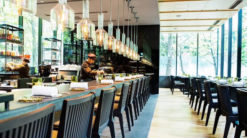 Modern dining space at The Café by Aman, ideal for events and meetings in Tokyo.