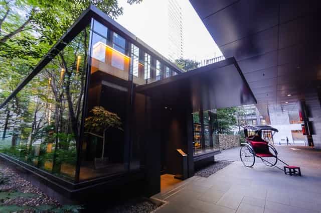 Sleek entrance of The Café by Aman, ideal for upscale events in Tokyo.