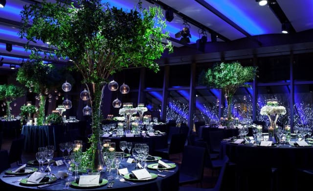 Elegant event space at Grand Hyatt Tokyo with lush greenery and ambient lighting.
