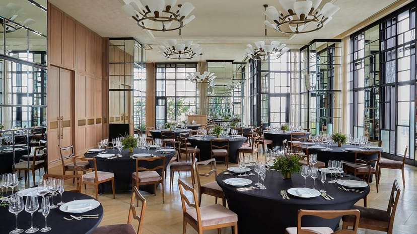 Elegant event space in Kimpton Shinjuku Tokyo with round tables for corporate gatherings.