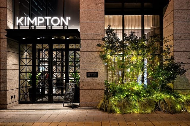 Kimpton Shinjuku Tokyo entrance with stylish architecture, ideal for networking events.