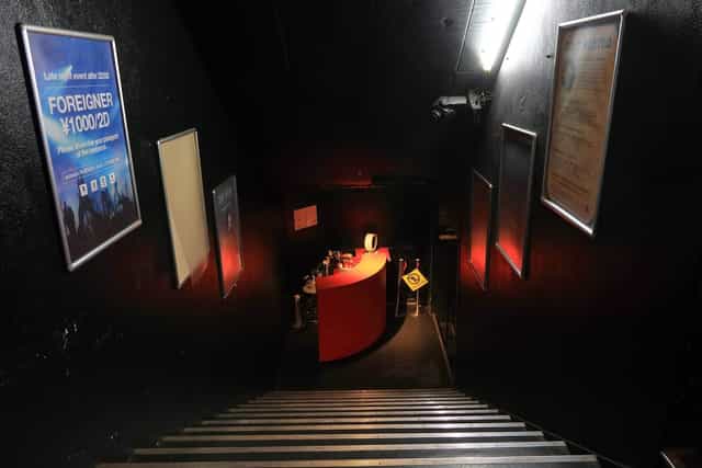 Dimly lit staircase at Club Asia's 1F Lounge, perfect for private events and gatherings.