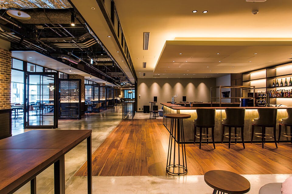Modern bar at Shibuya Excel Hotel Tokyu, ideal for events and meetings with warm lighting.