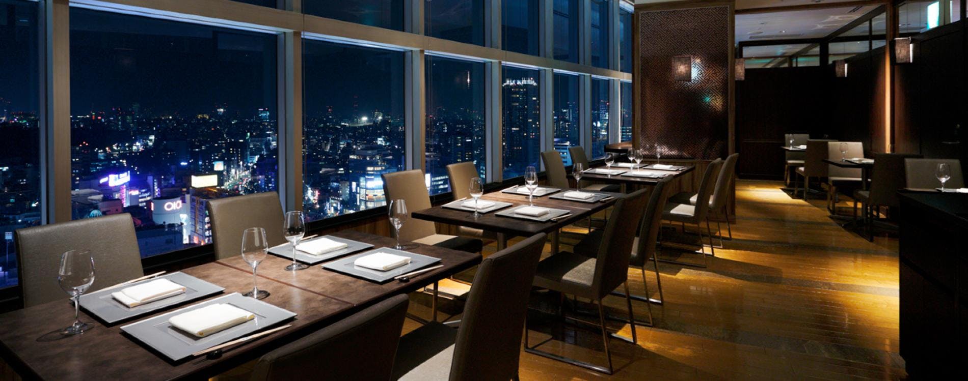 Elegant dining space with city views at Shibuya Excel Hotel Tokyu for corporate events.