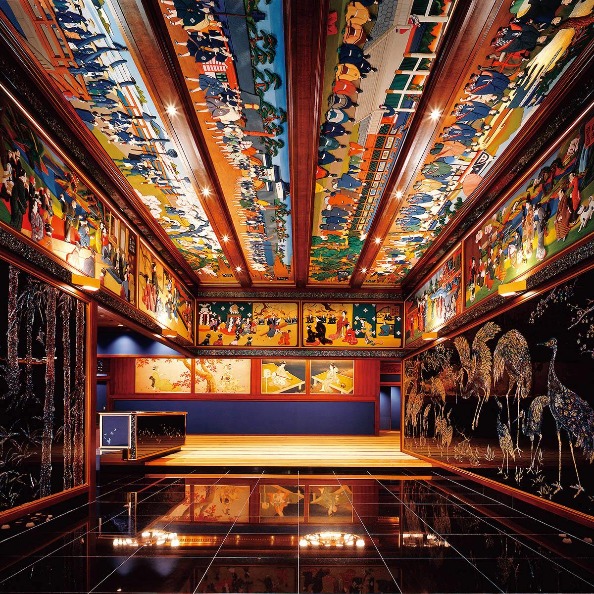 Event space with vibrant murals at Hotel Gajoen Tokyo for meetings and workshops.