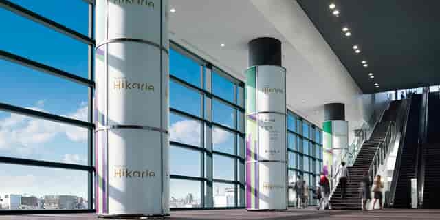 Modern Hikarie Hall event space with large windows, ideal for networking and meetings.