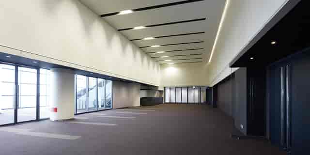 Modern Hikarie Hall venue with high ceilings, ideal for conferences and exhibitions.
