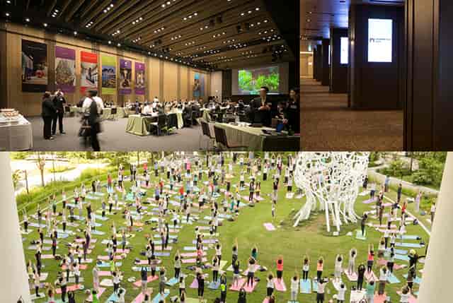 Toranomon Hills Forum: versatile event space with yoga and networking activities.