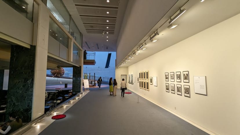Spacious gallery corridor with modern design for art exhibitions and networking events.