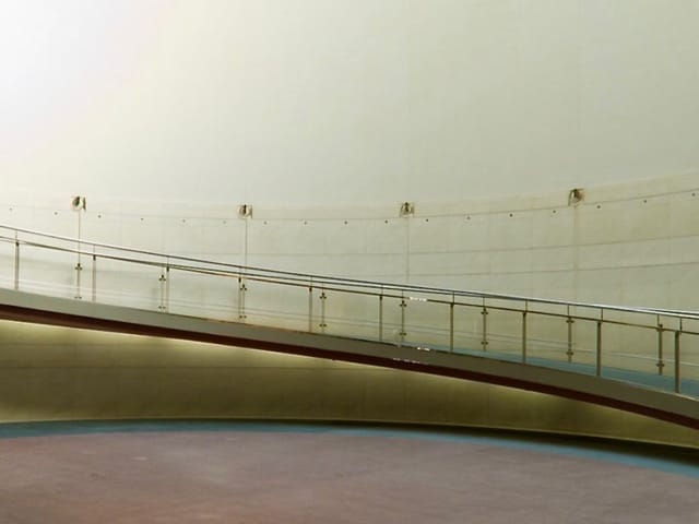 Atrium in Spiral: spacious minimalist venue with gentle ramp for networking events.