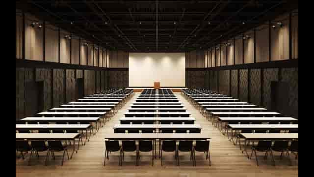 Spacious UDX Conference banquet hall set for professional events with modern design.