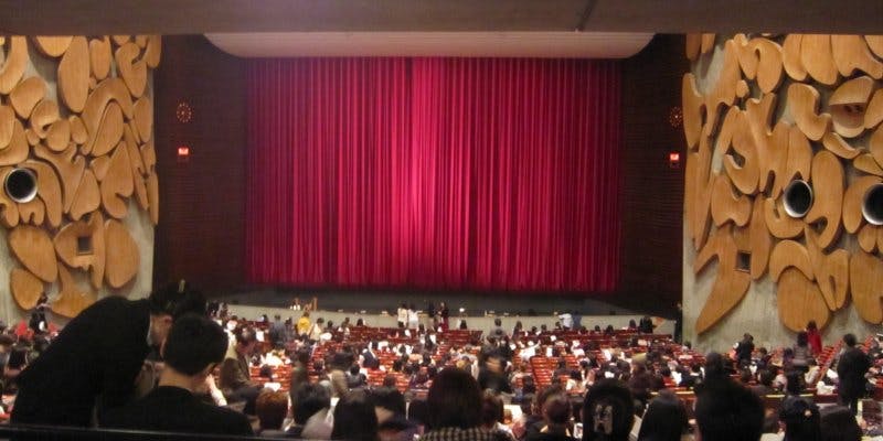 Main Hall Tokyo Bunka Kaikan with red curtain, ideal for performances and events.