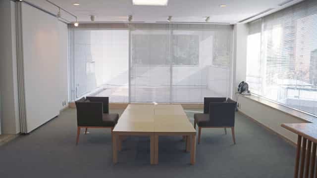Minimalist meeting space at E-Salon, Hillside Terrace, ideal for intimate discussions.