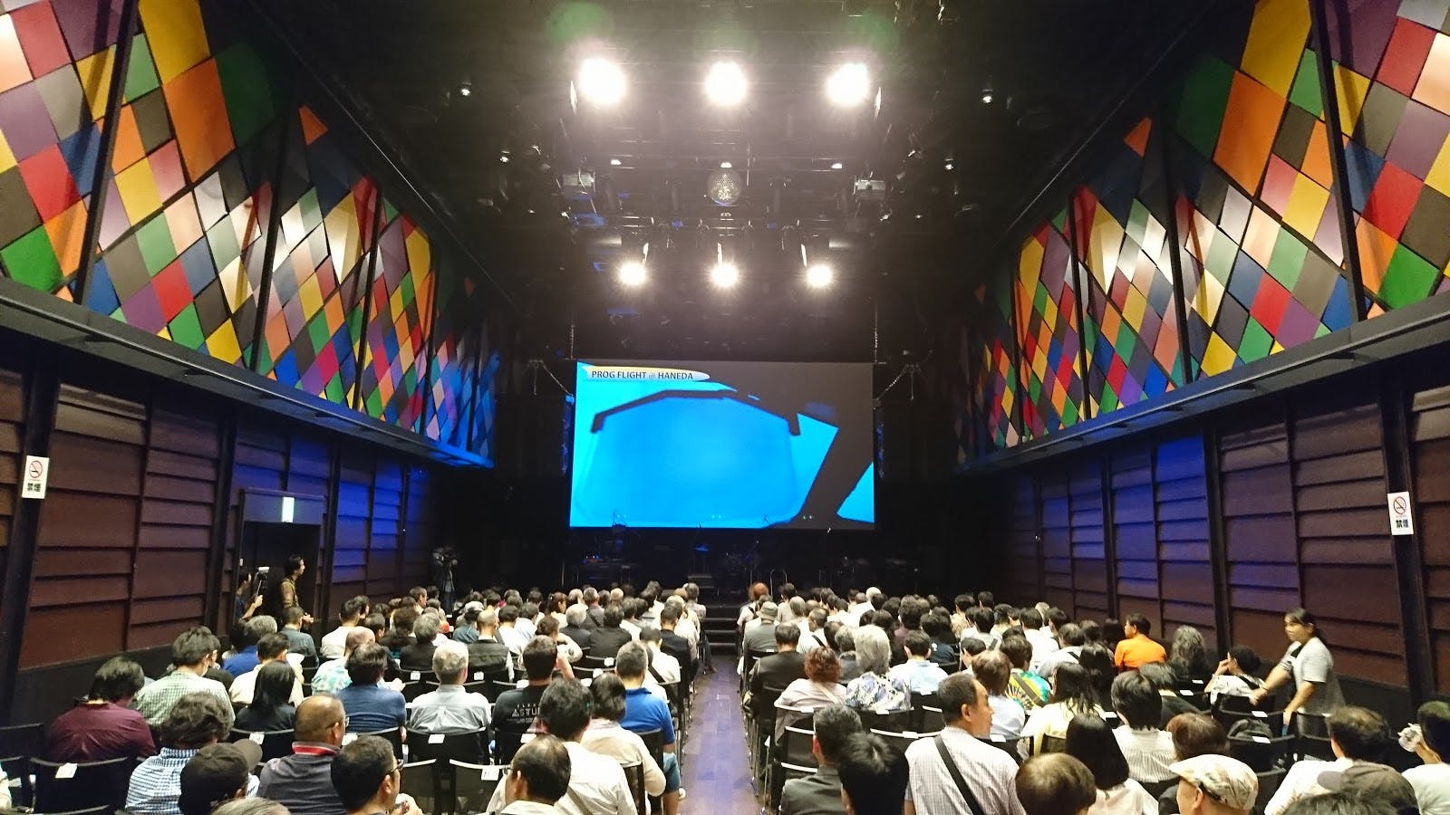 Dance hall in TIAT SKY HALL with vibrant walls, ideal for conferences and events.