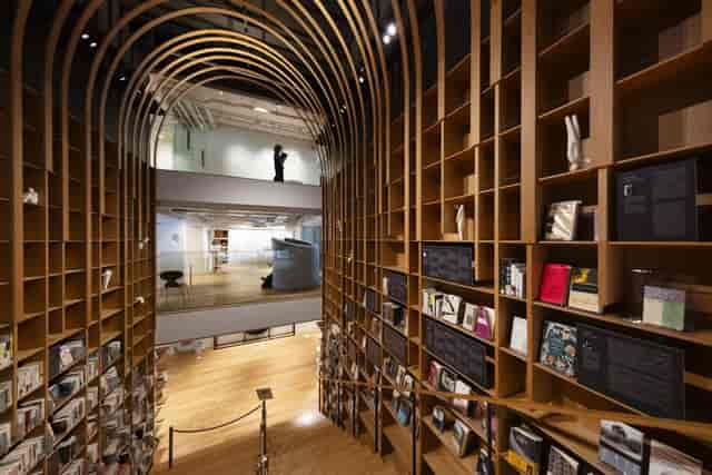 Waseda Gallery at Waseda University, featuring a stunning wooden archway for events.