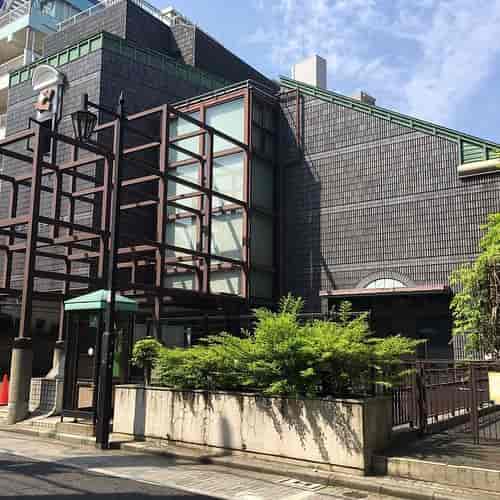 Modern Kōdōkan museum with glass and wood design, ideal for corporate events and gatherings.