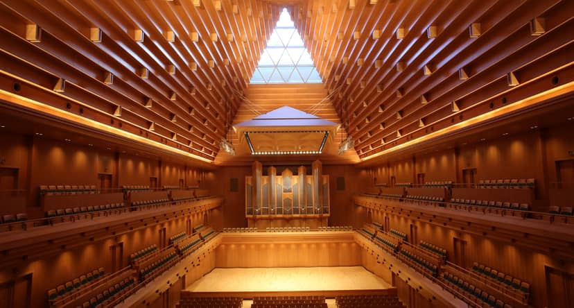 Tokyo Opera City concert hall with wooden interior, ideal for performances and events.