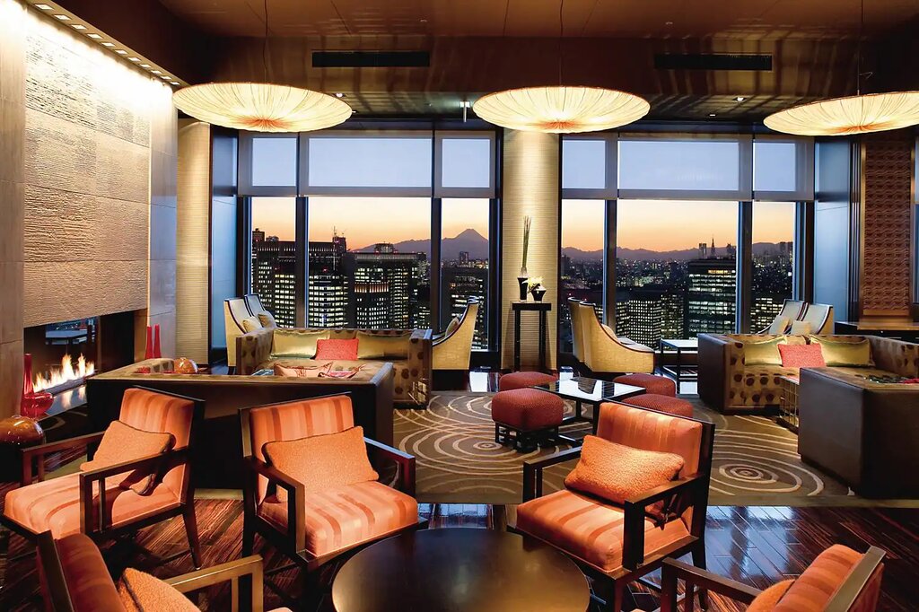 Sophisticated lounge at Mandarin Oriental Tokyo with panoramic city views for upscale events.