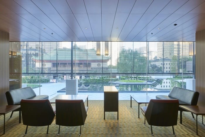 Modern meeting space at The Okura Tokyo with large windows, ideal for corporate events.