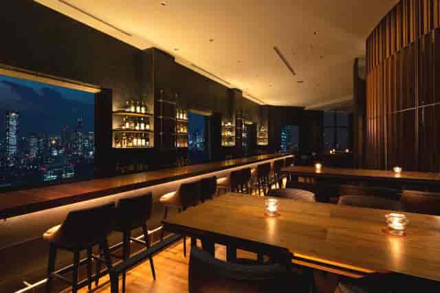 Rooftop bar at Cerulean Tower Hotel with city view, ideal for corporate events and gatherings.