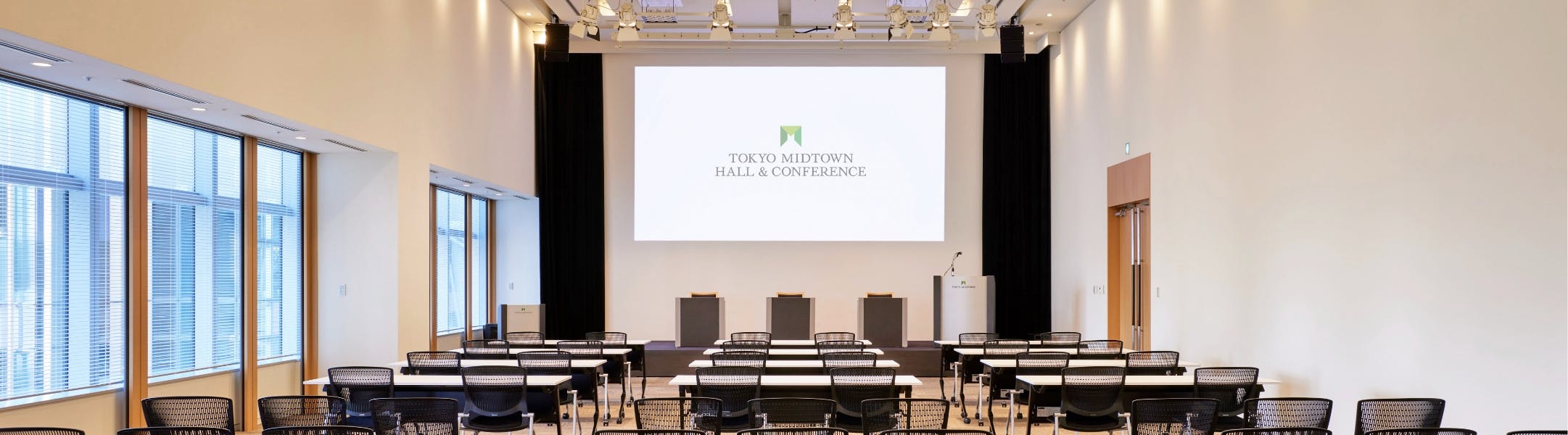 Conference room in Tokyo Midtown with large screen, ideal for professional events.