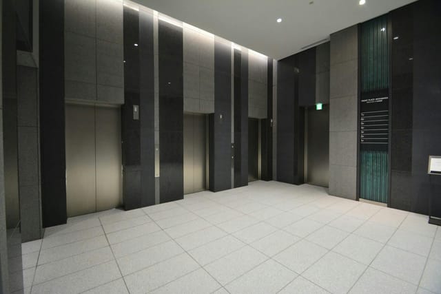 Modern elevator lobby in TKP Garden City PREMIUM Akihabara, ideal for upscale events.
