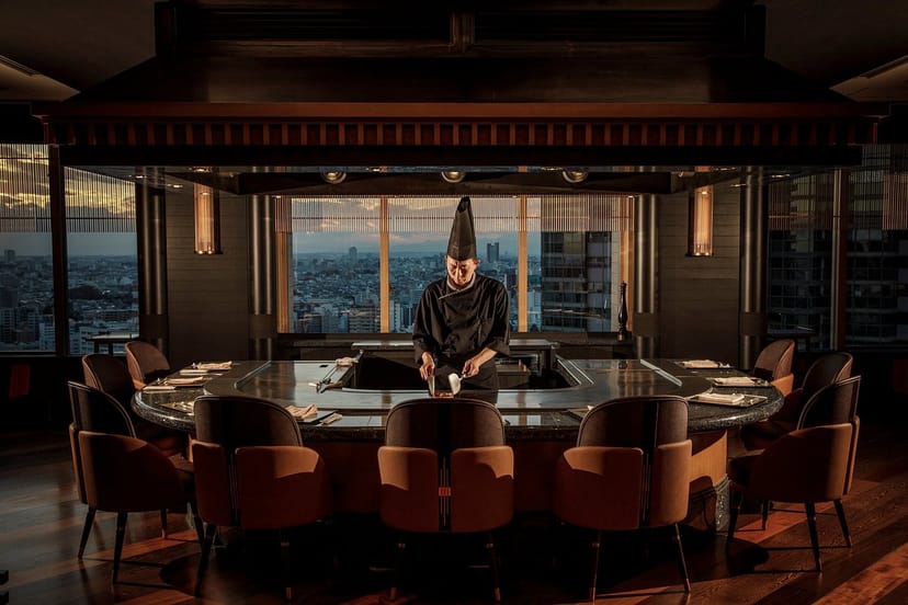 Private dining room in CRAFTALE with panoramic city view for exclusive events.