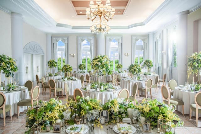Elegant wedding venue at Sheraton Grande Tokyo Bay with floral centerpieces.