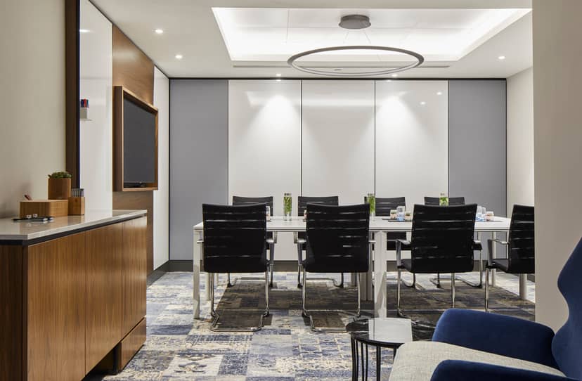 Modern meeting room at Cardiff Marriott with sleek furniture for professional events.