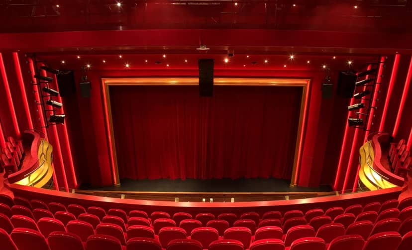 Rode foyer and Mary Dresslhuys Hall: vibrant red theater for conferences and performances.