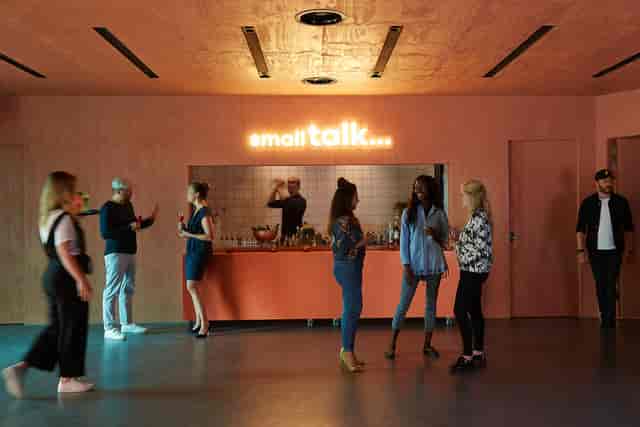 Parool theater networking space with stylish bar, ideal for events and mingling.