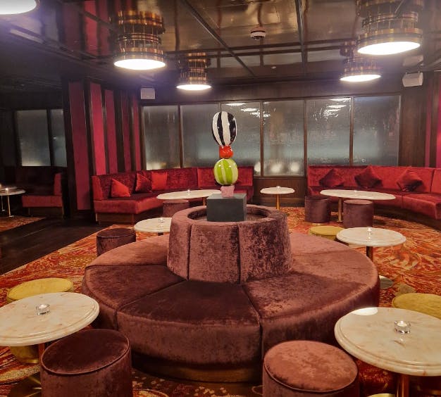 Stylish lounge with plush seating for intimate gatherings in Sael London.