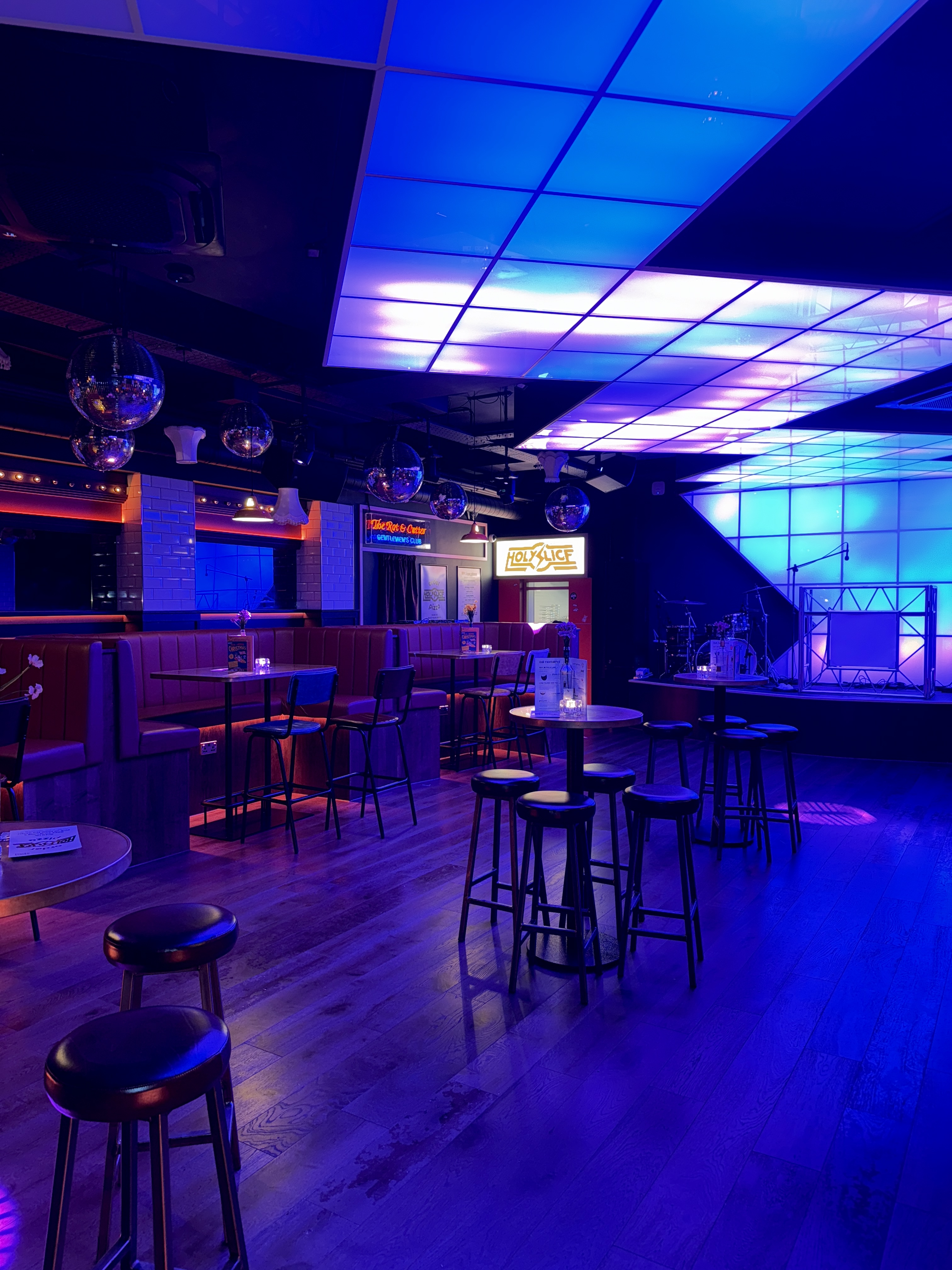 Half Venue Manchester: stylish event space with stage, perfect for gatherings and celebrations.