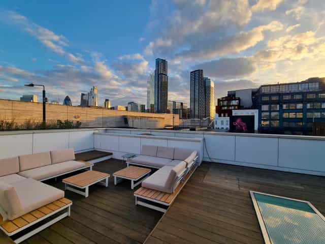 Stylish rooftop event space with skyline views at Sky Guild Gaming Centre.